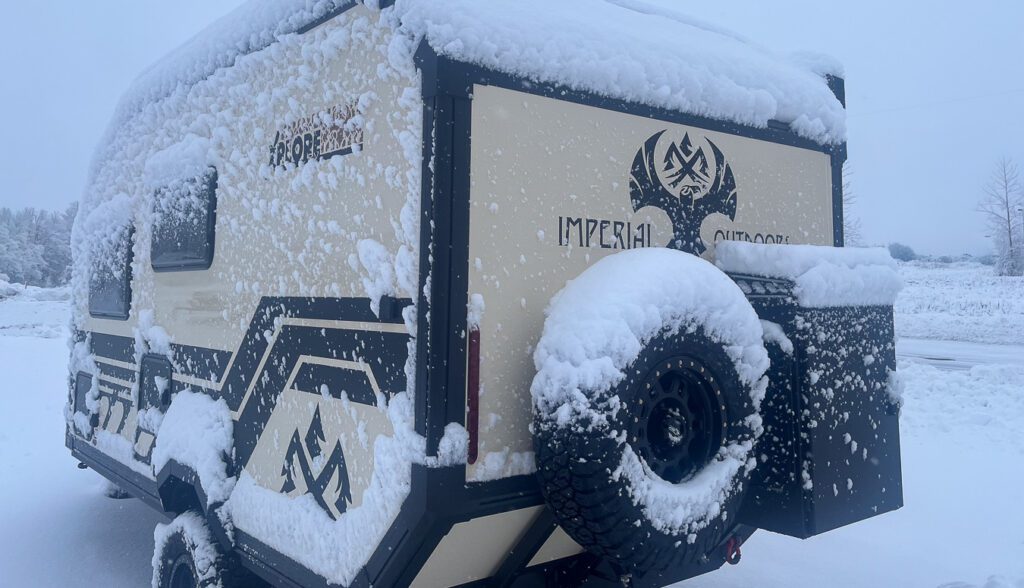 Winter camping in a snow and ice storm in the Imperial Outdoors X145.