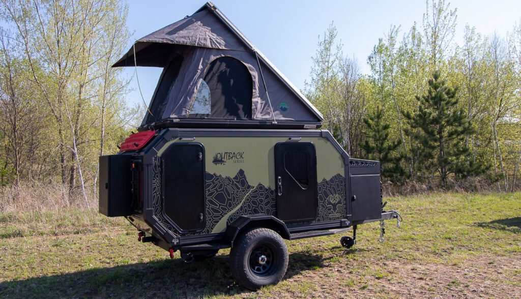 OVS tent installed onto the top of the OB120 for additional sleeping space.