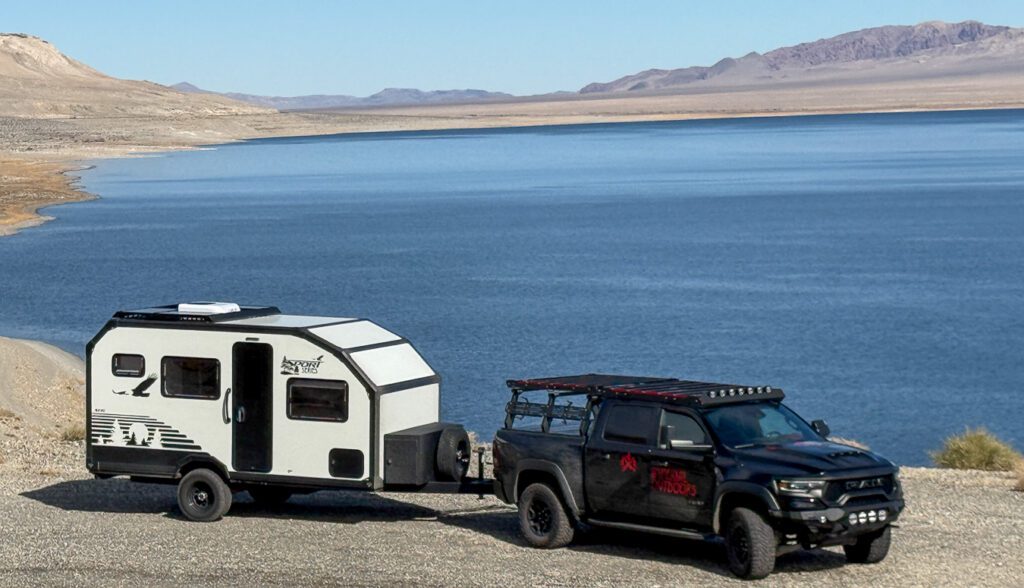Dodge TRX pulling the S145 along the off grid mountain lake in Montana.