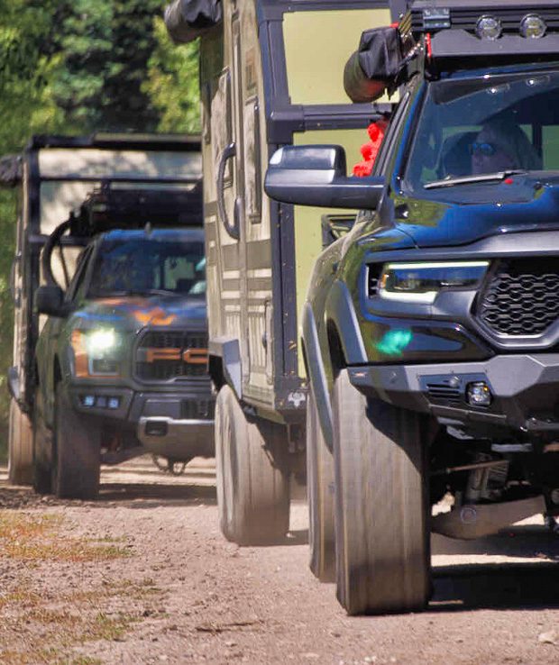 Imperial Outdoors Xplore Series X195 and X145 driving down forest service mountain road in Colorado.