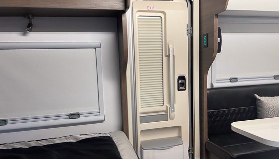 Heavy duty door on the Imperial Outdoors off grid trailer. It offer additional storage and privacy with the pull down blind.