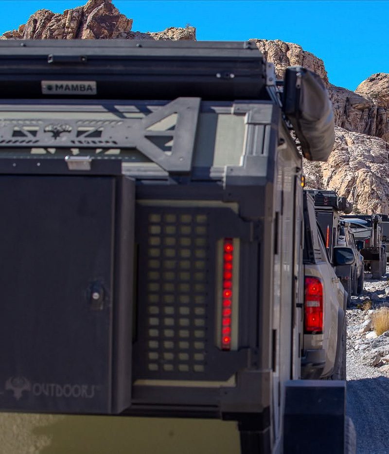 Imperial Outdoors OB120's traveling down a tight rocky trail.