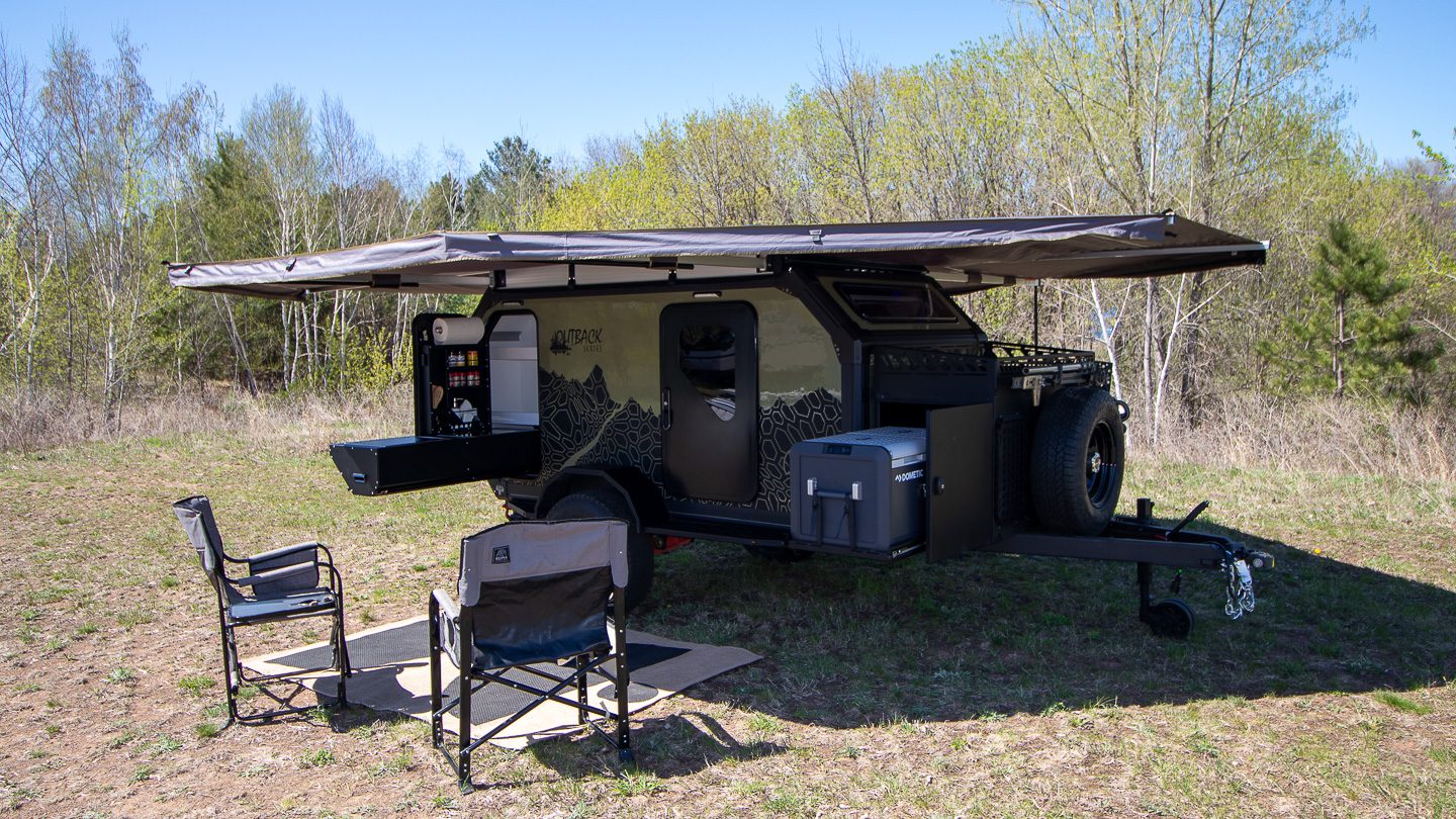 Imperial Outdoors OB120 set up off grid base camp in the woods.
