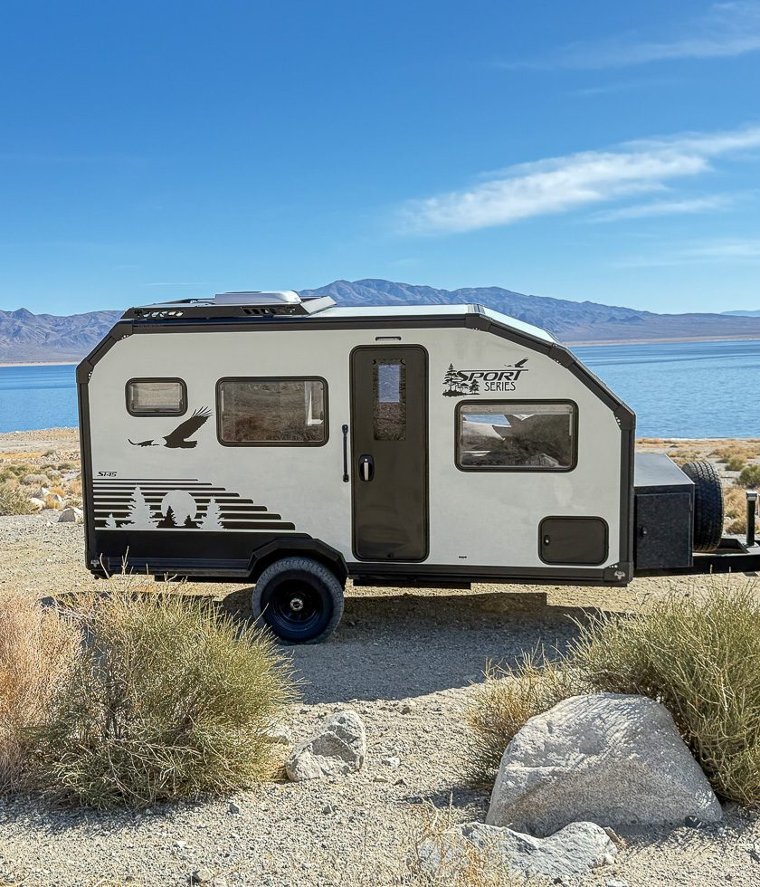 The S145 from Imperial Outdoors set up an off grid base camp long a lake.