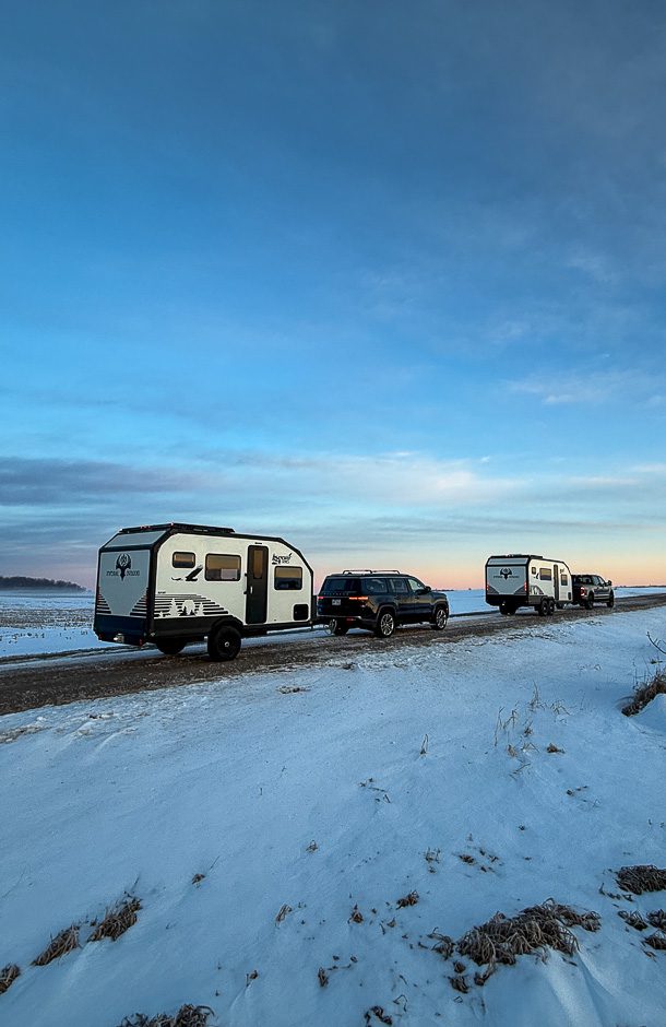 Imperial Outdoors Sport Series S145 and S195 bring pulled along snowy road.