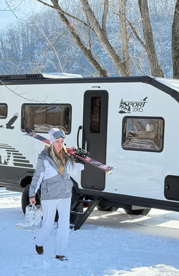 Imperial Outdoors S195 base camp and lady is going skiing in the mountains.
