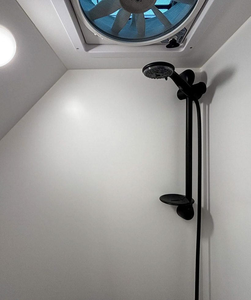 Hand held premium shower head in Imperial Outdoors Sport Series stand up shower.
