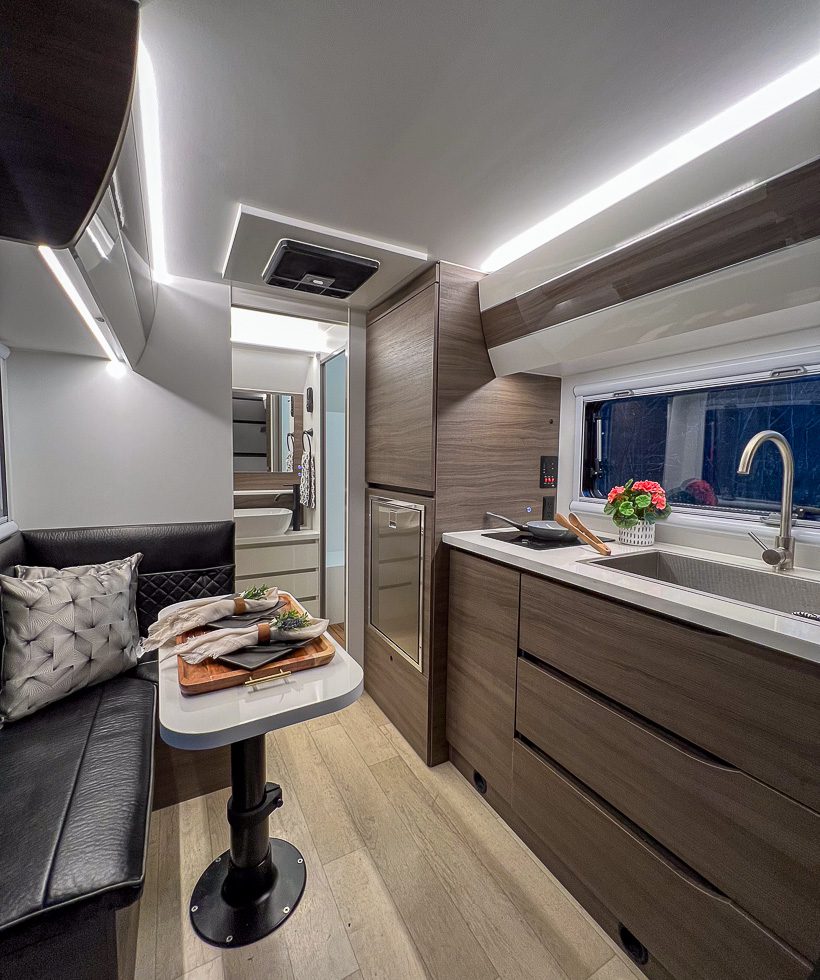Spacious interior table set up for dinner in the X145 from Imperial Outdoors.