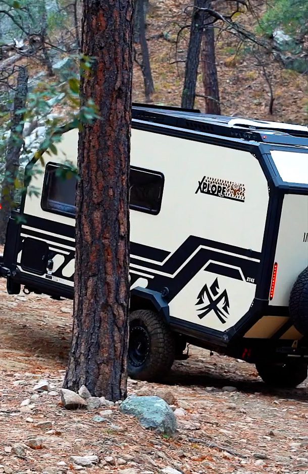 Off trailing in the woods of Arizona with the Rivian pulling the X145 from Imperial Outdoors.