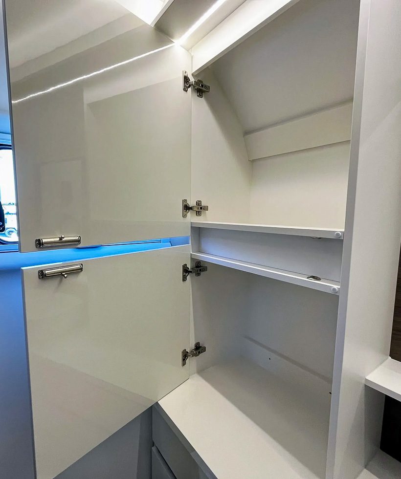 Upper vanity cabinet in the bathroom of the Imperial Outdoors X195.
