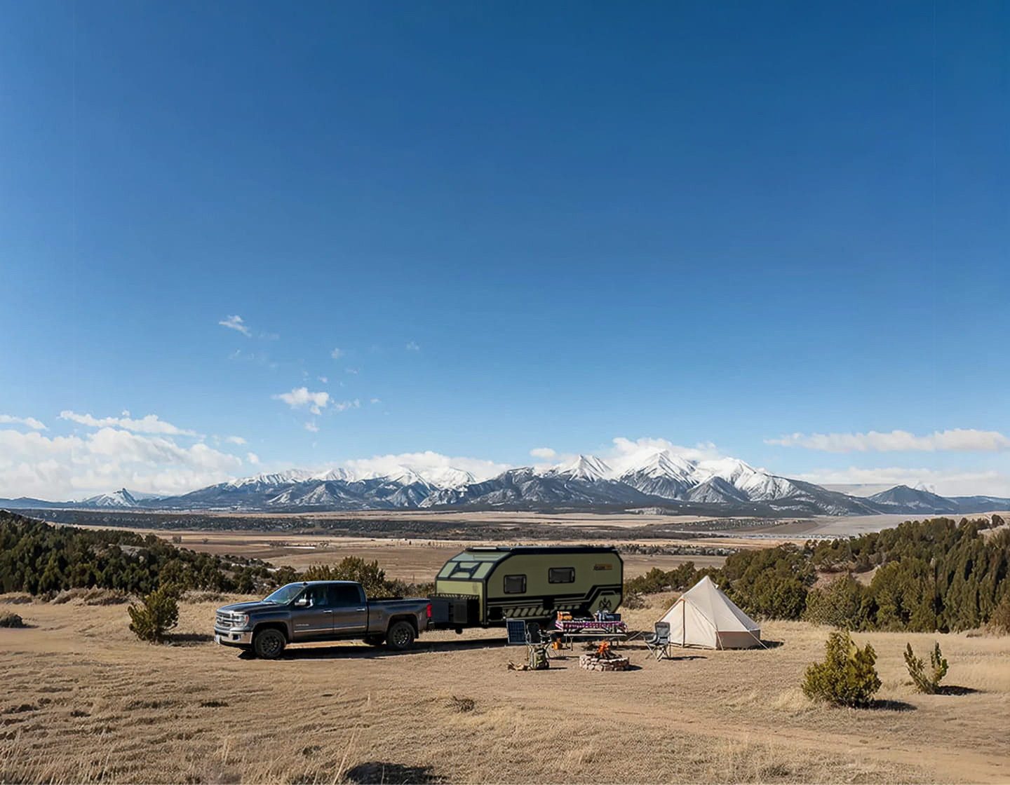 Imperial Outdoors off grid Base camp with snow capped Montana Crazy Mountains in background.