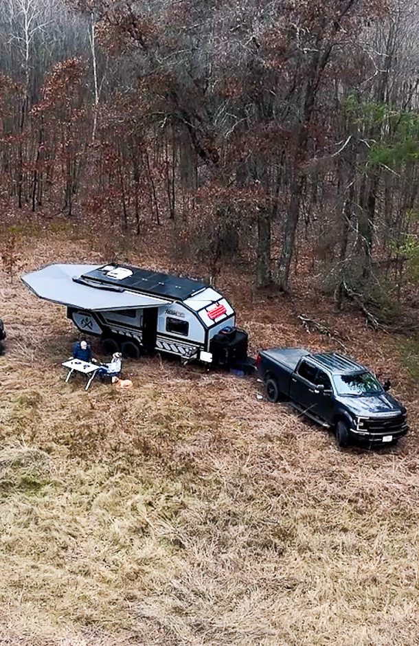 Imperial Outdoors off the grid at remote camping site in the forest.