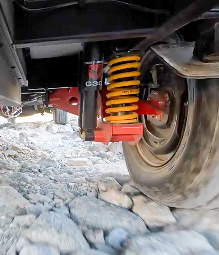 The OB120 from Imperial Outdoors has the Cruisemaster CRS suspension crawling over a rocky terrain.