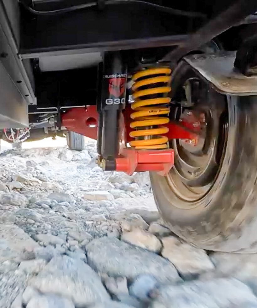 Imperial Outdoors Outback Series OB120 crawling along a rock terrain trail use the Cruisemaster CRS off road suspension.