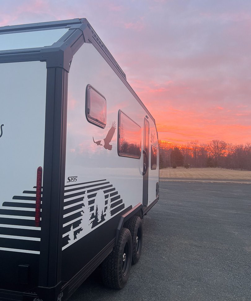 Gorgeous sunset at base camp in an Imperial Outdoors Sport Series off grid camper.