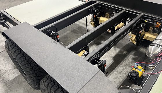 Heavy duty coated chassis on the Imperial Outdoors Xplore off grid camper.