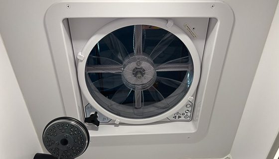 Airxcel Deluxe Maxxfan installed in the bathroom of the Imperial Outdoors off grid camper.