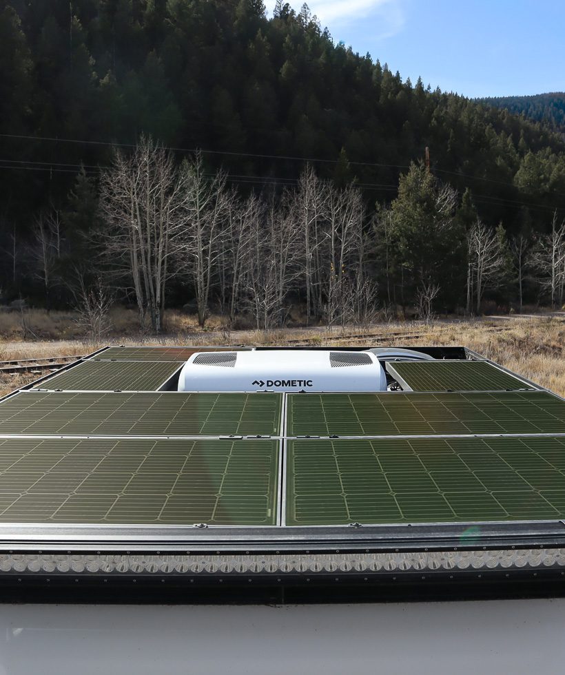 Imperial Outdoors Xplore Series off grid solar panels and 12v Dometic RTX 2000 air conditioner in the mountains of Colorado.