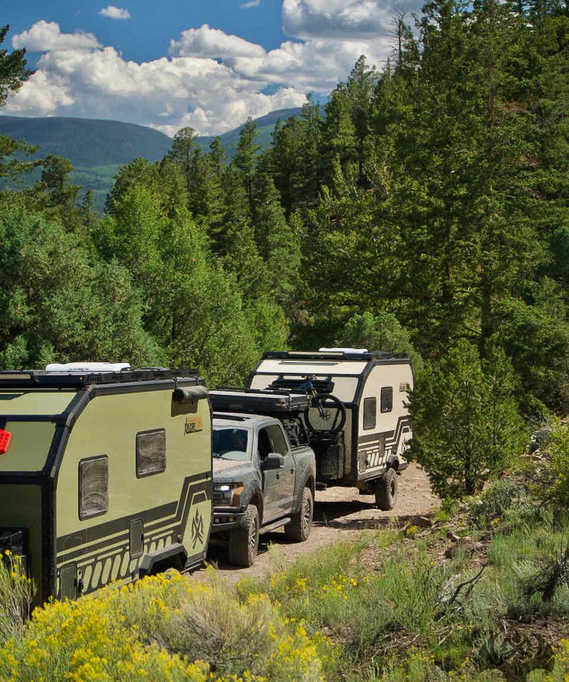 Imperial Outdoors Xplore Series X195 and X145 driving on mountain road in Colorado trails.