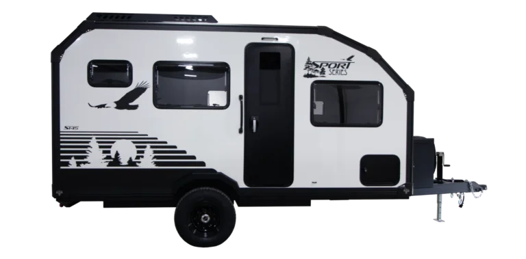 A white and black Xplore Series travel trailer with graphic designs of birds and trees on the side, single axle, and a side door with windows. The front features a hitch for towing, perfect for those seeking an off-road trailer adventure.